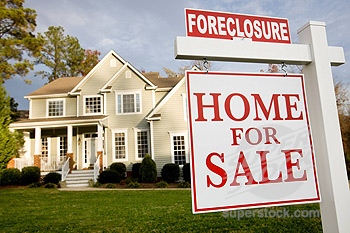 HOME WITH FORECLOSURE SIGN